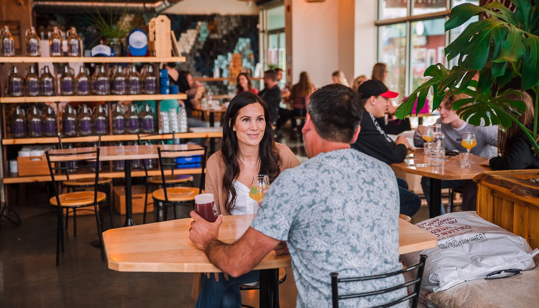 Couple at Bright Eye Brewing enjoying at beer on Kamloops North Shore.
